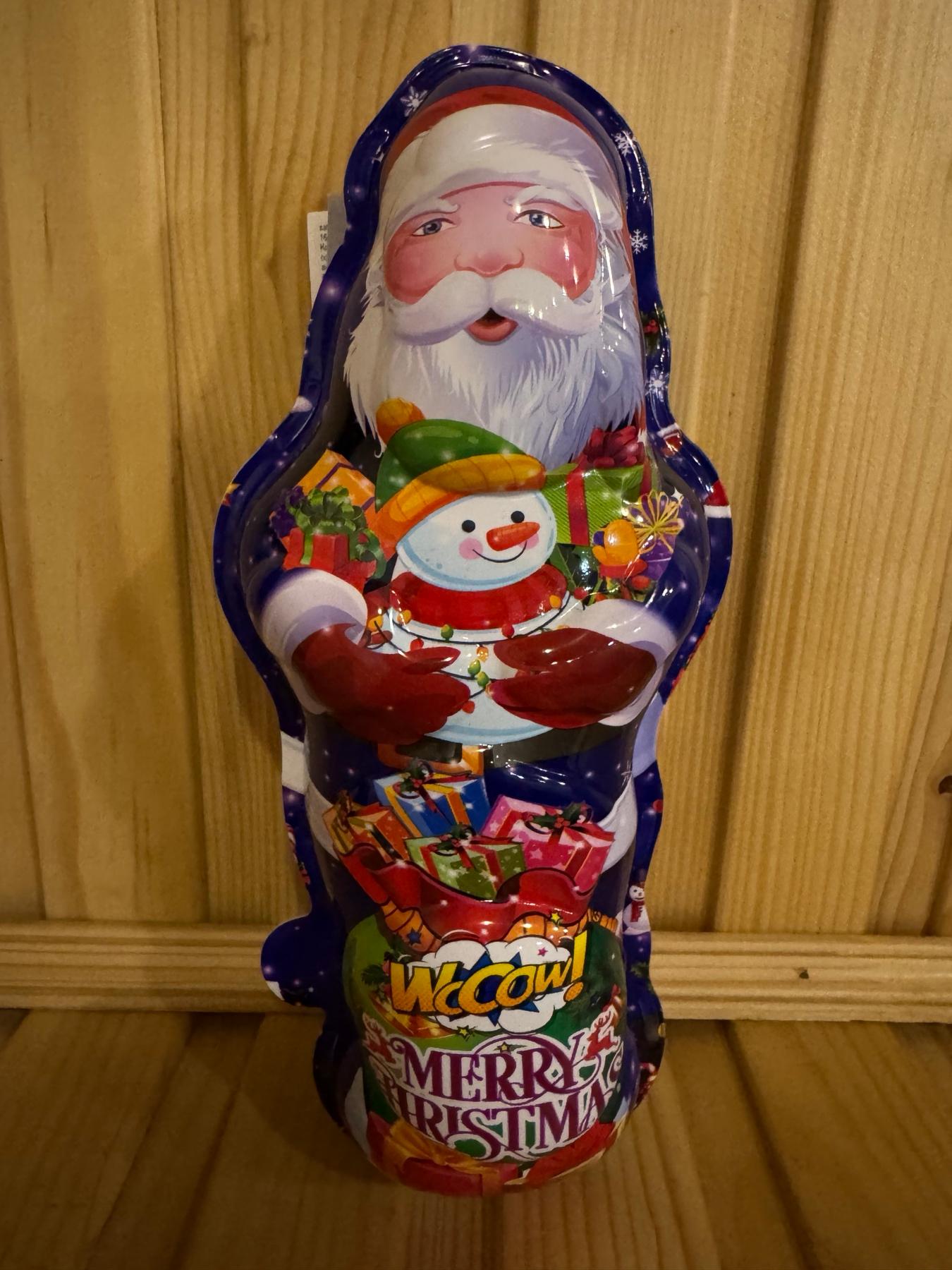 Фігурка пластикова що світиться з цукерками та сюрпризом  Новорічний Санта 60г